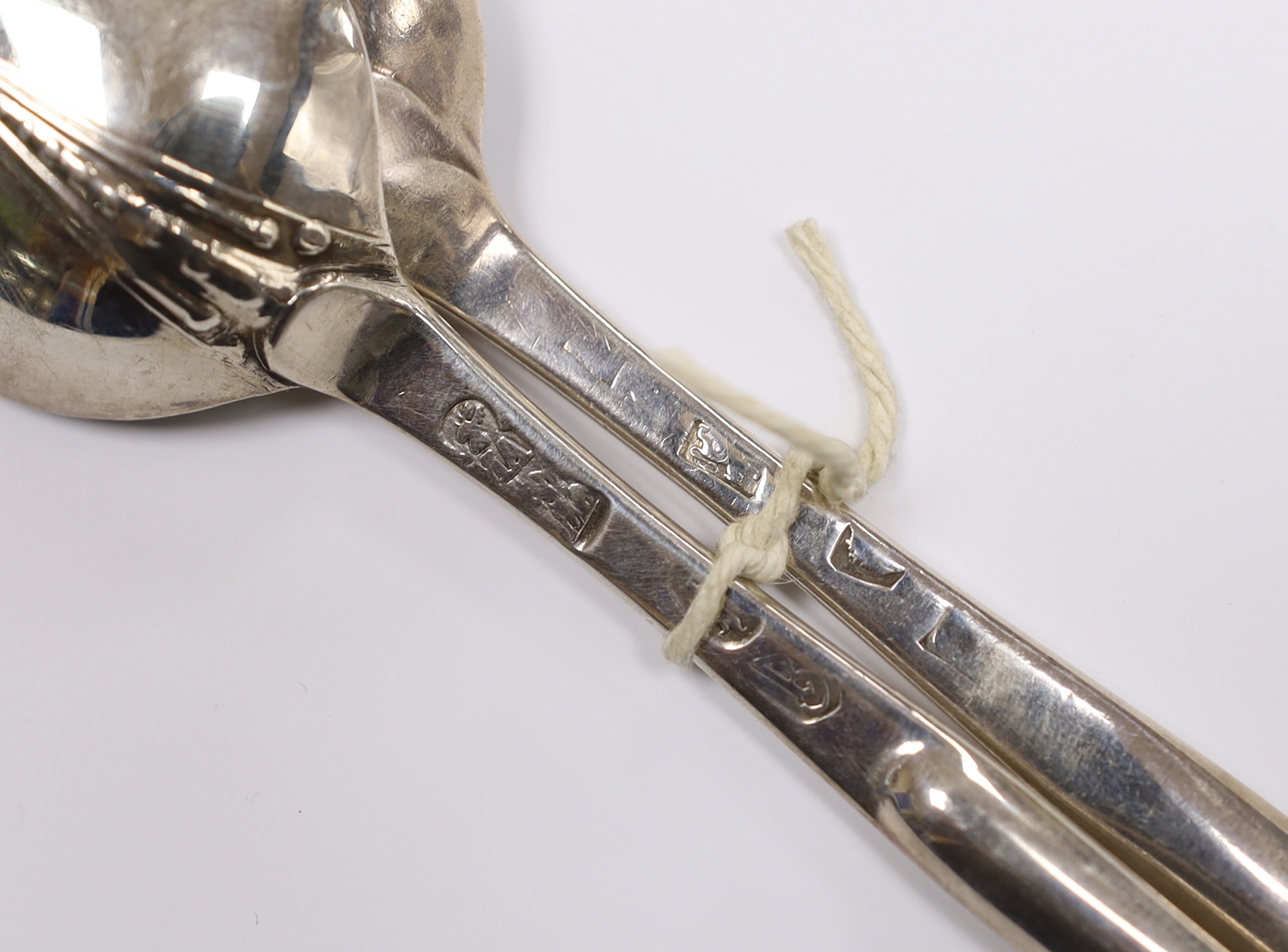 Two 18th century silver combinations marrow scoop spoons, William Matthew I, London, 1703, with rat tail back and later with rubbed marks.